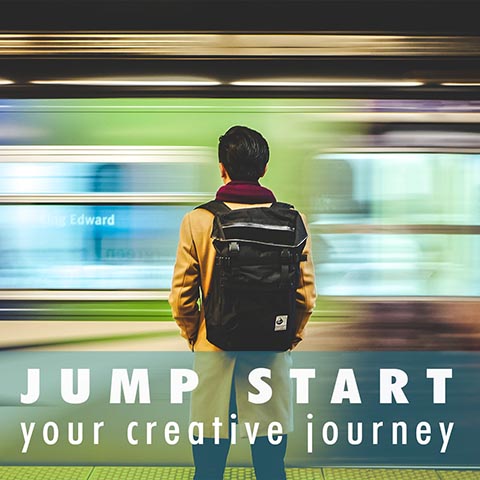 Jump Start Youur Creative Journey - a man stands with his back to the camera looking at a subway train wooshing by